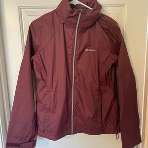 Columbia rain jacket, size medium. Purple/Maroon color. Never worn before!